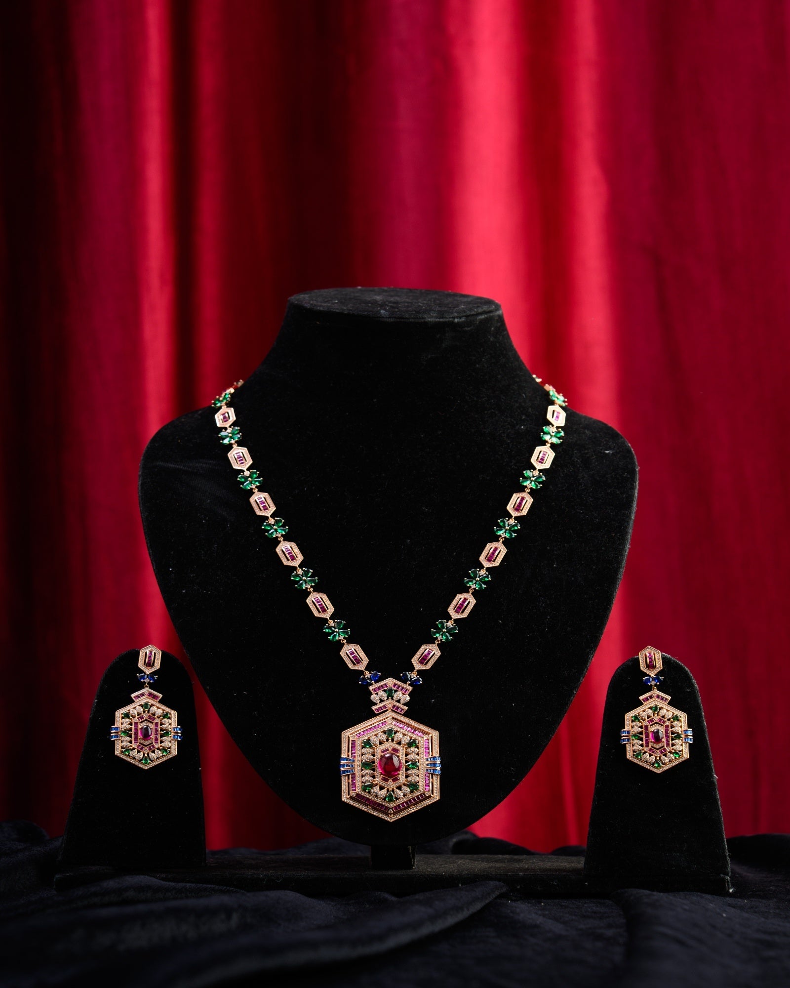 Ruby and Emerald Embossed Handcrafted Rose Gold Plated Necklace with Earrings