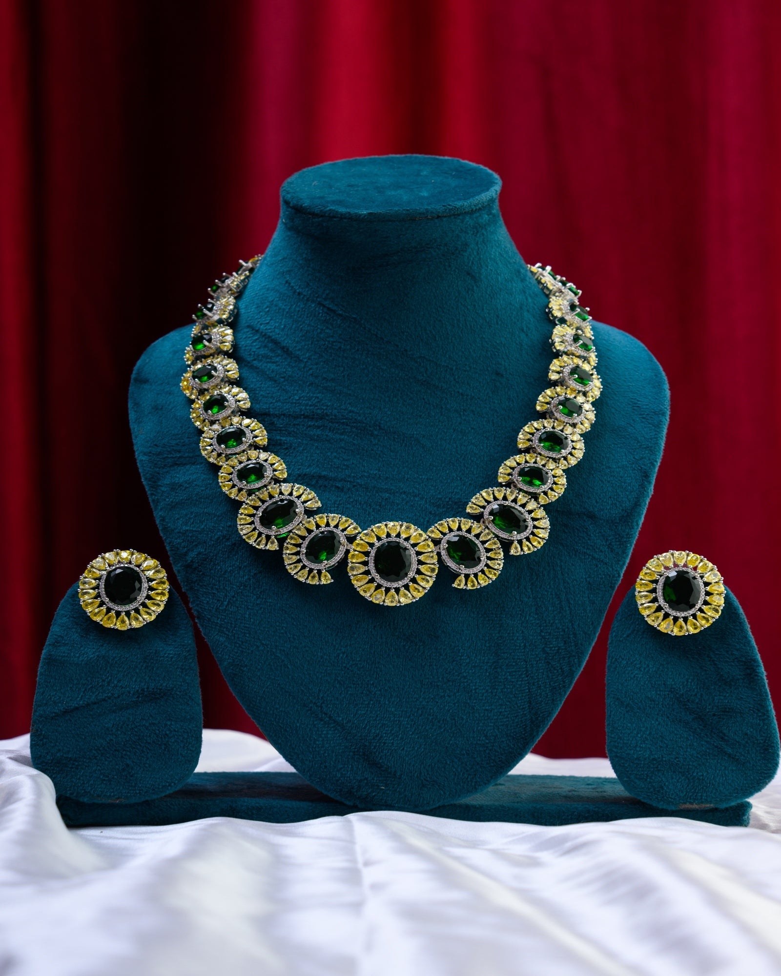 Green Stones Embossed Yellow AD Necklace with Earrings
