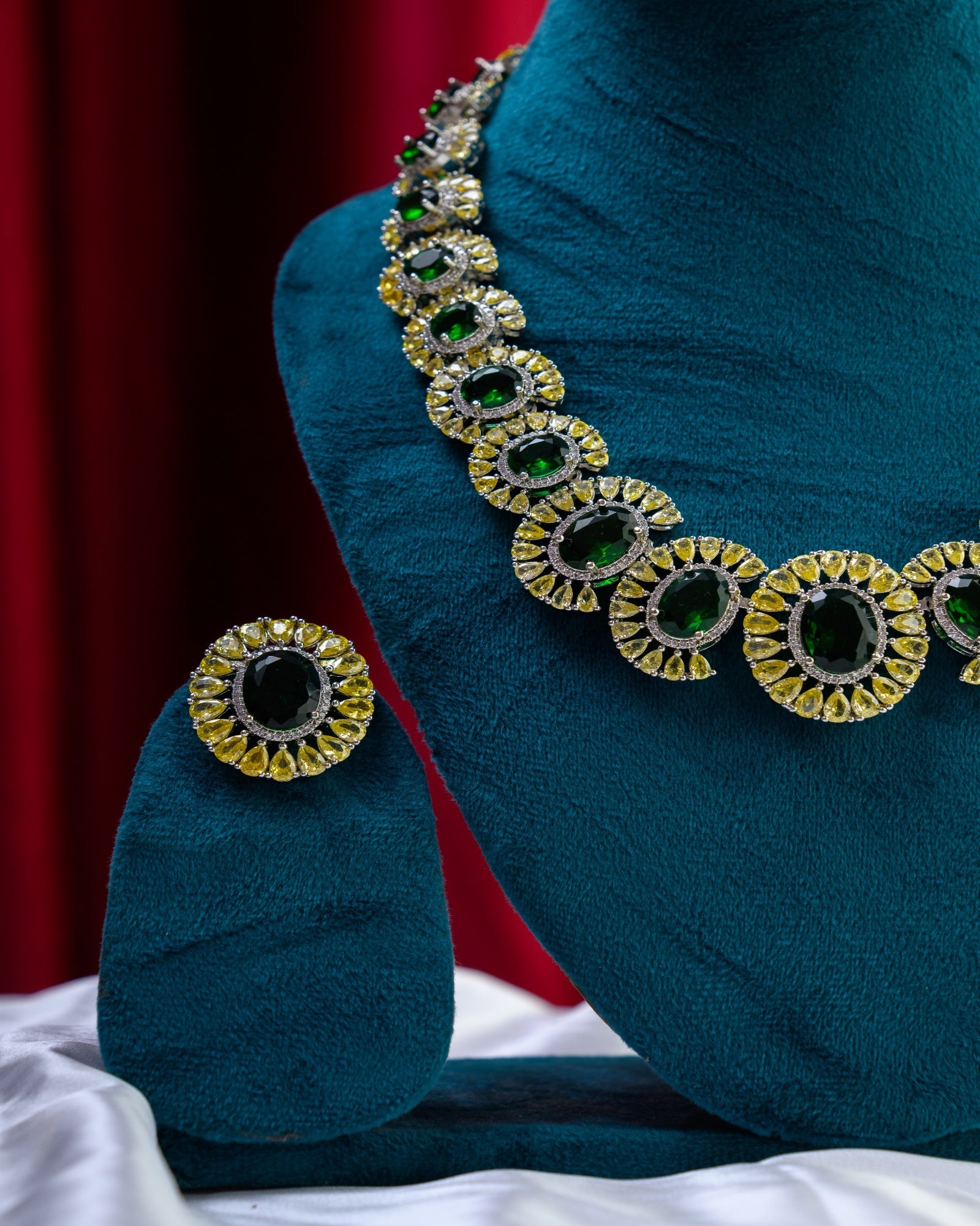 Green Stones Embossed Yellow AD Necklace with Earrings