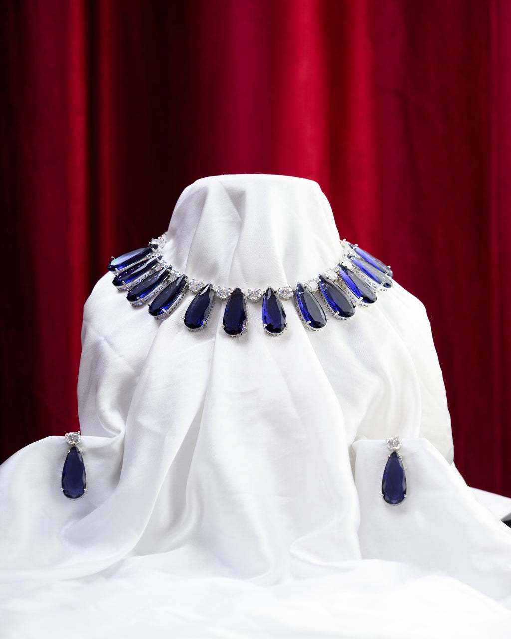 Blue Bold Glass Stone with AD Necklace with Earrings